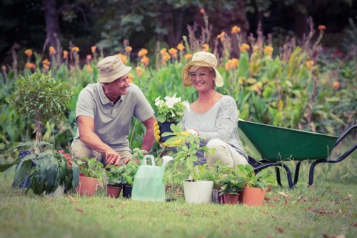Operative using protective equipment on a landscaping site