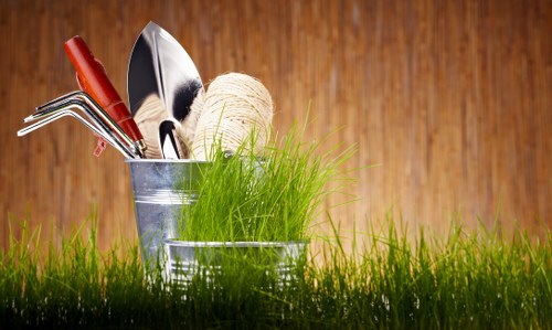 Professional landscapers improving an outdoor space in Havering
